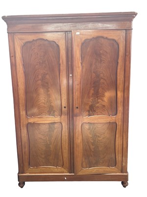 Lot 146 - Late 19th century mahogany two door wardrobe with hanging and shelved interior