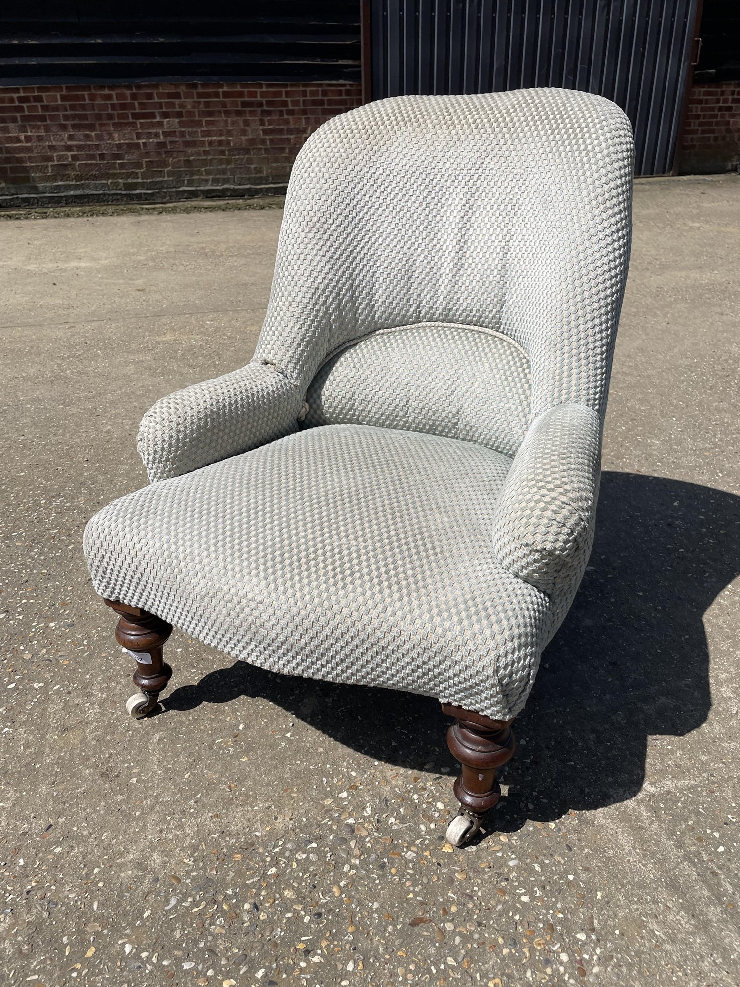 Lot 152 Victorian tub chair, with blue upholstery on