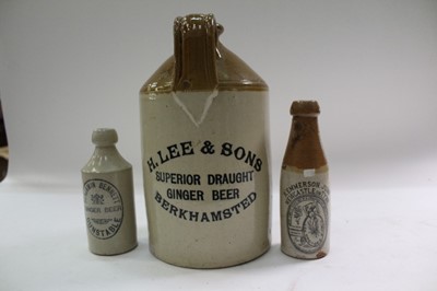 Lot 2481 - Large collection of glass advertising bottles, including Emmerson of Newcastle, with stoneware flagons