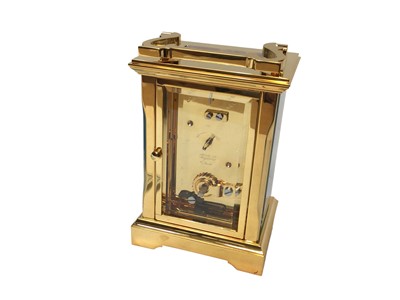 Lot 2409 - Garrard London brass cased carriage clock, with winding key, certificate and boxed as new