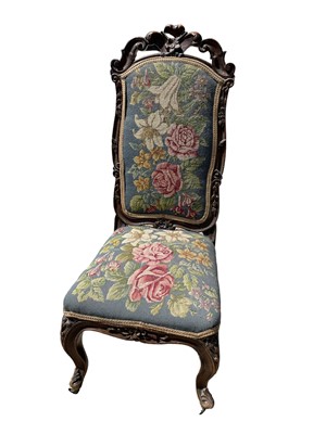 Lot 171 - Victorian nursing chair with floral tapestry seat and back on carved cabriole legs, 89cm high