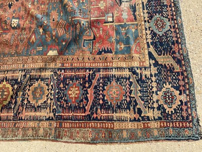 Lot 1587 - Good quality large antique Heriz rug, reduced in size