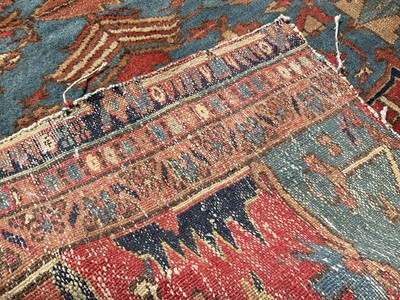 Lot 1587 - Good quality large antique Heriz rug, reduced in size