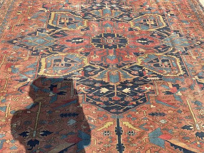 Lot 1587 - Good quality large antique Heriz rug, reduced in size