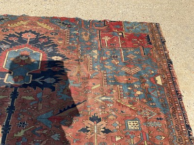 Lot 1587 - Good quality large antique Heriz rug, reduced in size