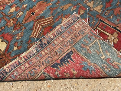 Lot 1587 - Good quality large antique Heriz rug, reduced in size