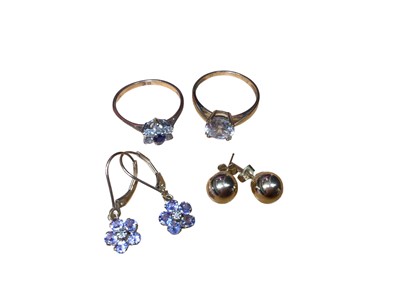 Lot 53 - 9ct gold sapphire and diamond flower head cluster ring, one other 9ct gold synthetic single stone ring, pair of 9ct gold ball stud earrings and pair of gold (10k) gem set flower head earrings