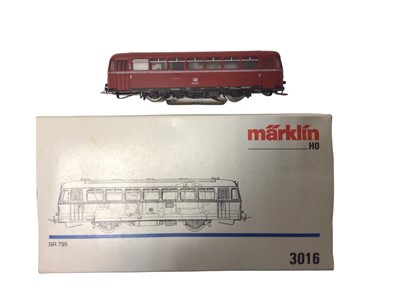 Lot 1855 - Marklin HO gauge 3 rail locomotives including Swedish orange with white stripes electric locomotiveNo. Re 1010, DB maroon railbus, No.795 299-7 and another DB maroon railbus (unboxed) (3)