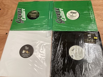 Lot 2245 - Two boxes of ex. DJ 45's and 12" singles