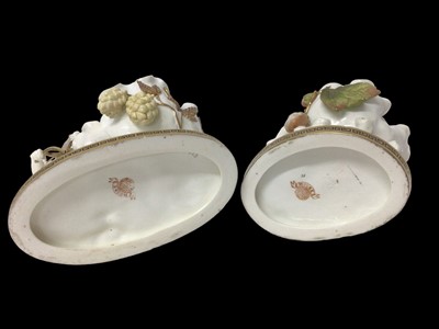 Lot 283 - Two similar late 19th century Moore Bros. porcelain sweetmeat baskets decorated with cherubs and gilt ornament