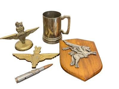 Lot 655 - Lot British Parachute Regiment / Airborne Division metalware comprising two brass display badges, plaque, shell art and tankard (5)