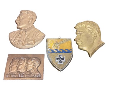 Lot 666 - Old cast metal bust plaque of Hitler, 21cm high, two others including Stalin and German Old Comrades plaque (4)