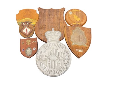 Lot 671 - Collection of old military wall plaques including carved and painted wood examples with badges (3 boxes)