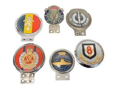 Lot 676 - Six old military car badges including The Commando Association (6)