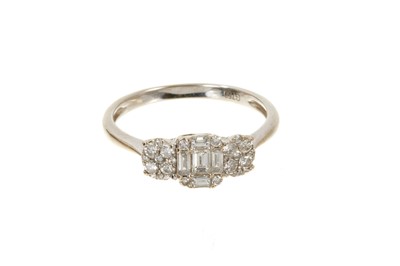 Lot 704 - Diamond cluster ring in 18ct white gold setting