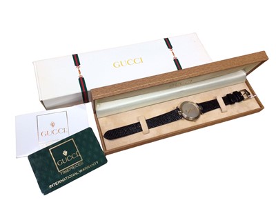 Lot 90 - Vintage Gucci wristwatch with original boxes and warranty card