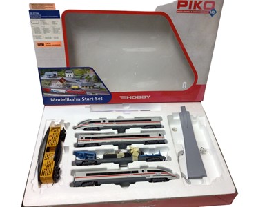 Lot 1859 - Marklin HO gauge DB Ice Inter City Express with two motorised units and five carriages and similar Piko parts