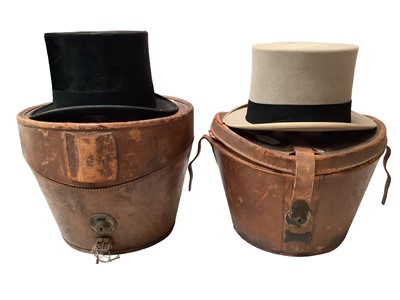 Lot 2177 - Black top hat by The Army & Navy Cooperative in Army & Navy leather top hat box, grey Henry Heath top hat box.