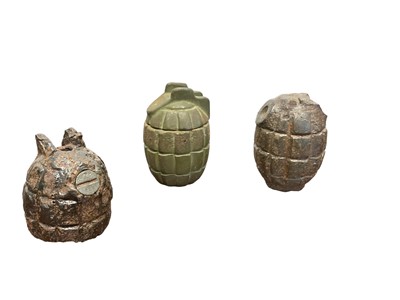 Lot 691 - Two Great War grenade casings and one other (3)