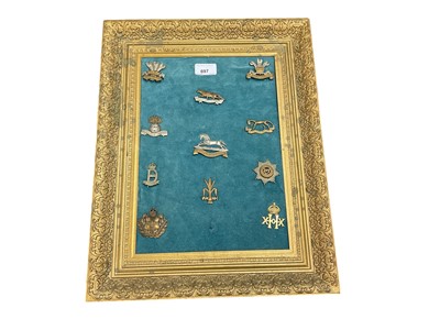 Lot 697 - Collection 11 British Cavalry cap badges mounted in frame