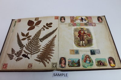 Lot 1562 - Victorian scrap book containing crests, drawings, paper lace valentines and greeting cards, political and other cartoons, stamps, engravings, fashoin, dried folage,  personalities, scraps flowers,...