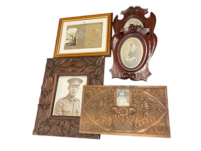 Lot 702 - Lot First World War carved wooden frames and framed poppy 'picked from the battlefields at Ypres 1923' (5)