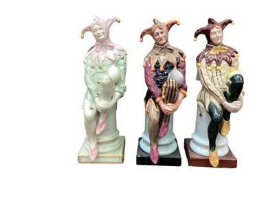 Lot 1071 - Royal Doulton limited edition figure - The Jester HN3922, no.176 of 950, together with another HN2016 and an unmarked figure (3)