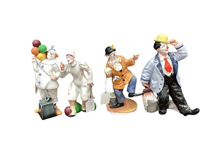 Lot 1073 - Four Royal Doulton Clowns - Balloon Clown HN2894, The Joker HN2252, The Clown HN2890 and Slapdash HN2277