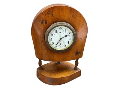 Lot 744 - First World War period clock constructed from a wooden aircraft propeller, 23cm in overall height.