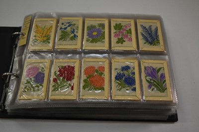 Lot 1519 - Cigarette cards Silks collection in albums including Kenistas Flowers small & medium in folders, BDV large Royalty, large Old Masters, Regimental colours etc. (Qty)