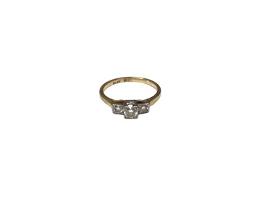 Lot 123 - Art Deco 18ct gold diamond three stone ring in platinum setting