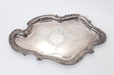 Lot 514 - Victorian silver tray of shaped form with floral engraved cartouche