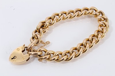 Lot 693 - Edwardian 15ct gold curb link bracelet with padlock clasp