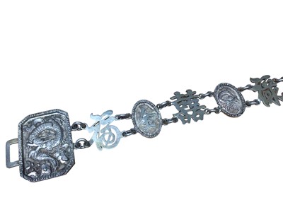 Lot 127 - Chinese white metal belt with character mark, dragon and bamboo decoration to the panels, 63cm long