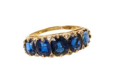 Lot 604 - Antique sapphire five stone ring with five graduated oval mixed cut blue 
sapphires