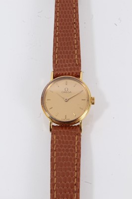 Lot 756 - Lady’s Omega Quartz wristwatch in circular 18ct gold case