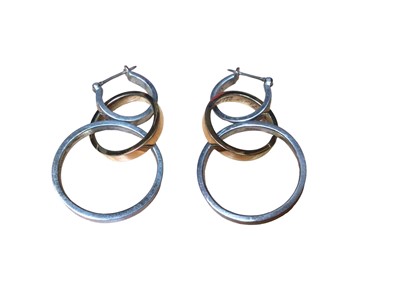 Lot 212 - Pair of Tiffany & Co. Paloma Picasso 18ct yellow gold and silver triple hoop earrings