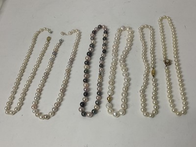 Lot 619 - Six cultured pearl necklaces, mostly with gold clasps