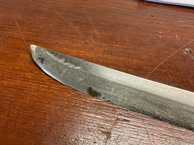 Lot 810 - Antique Japanese Katana sword with curved blade and signed tang with regulation military mounts and dress knot in leather covered sheath. The blade 68.5 cm