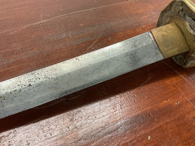 Lot 810 - Antique Japanese Katana sword with curved blade and signed tang with regulation military mounts and dress knot in leather covered sheath. The blade 68.5 cm