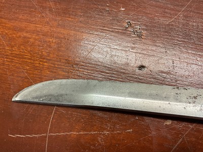 Lot 810 - Antique Japanese Katana sword with curved blade and signed tang with regulation military mounts and dress knot in leather covered sheath. The blade 68.5 cm