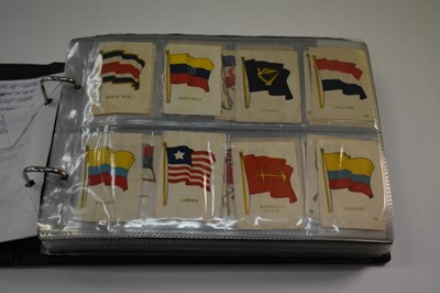 Lot 1535 - Cigarette card Silks selection in album of Godrey Phillips Flags various series & others