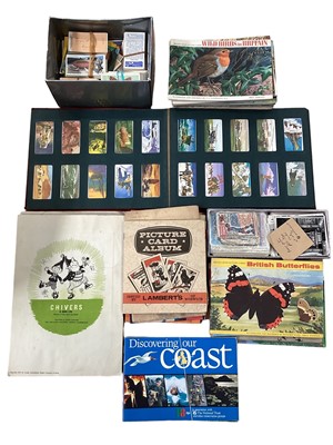 Lot 1555 - Trade cards large box of mostly Brooke Bond stuck in albums, Enid Blyton, Noddy & others