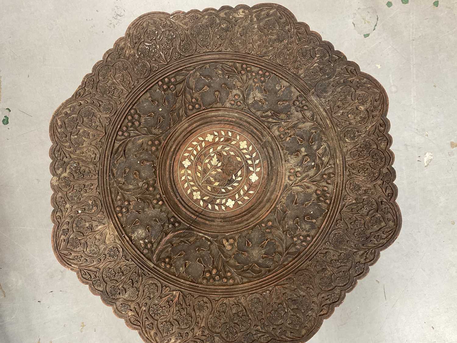Lot 2437 - Carved middle eastern occasional table