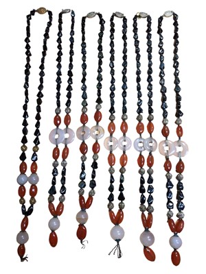 Lot 129 - Six Chinese hematite, carnelian, rose quartz and white metal filigree bead necklaces with silver clasps