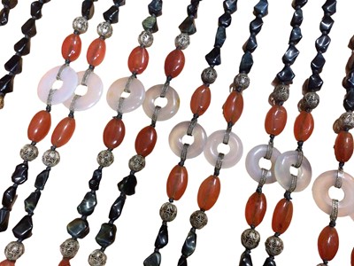 Lot 129 - Six Chinese hematite, carnelian, rose quartz and white metal filigree bead necklaces with silver clasps