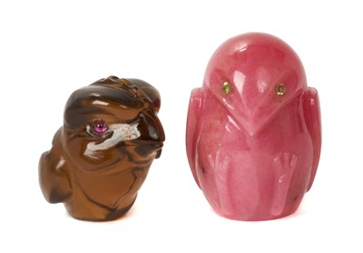 Lot 5 - Two Imperial Russian Carl Fabergé carved hard stone bird ornaments comprising a pink Rhodonite owl with diamond set eyes 2cm high and brown hard stone chick with ruby eyes 1.6 cm, (2) Sold with cop...