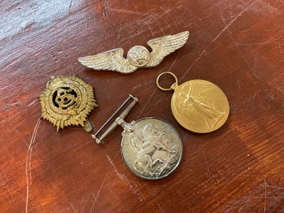 Lot 749 - First World War Pair comprising War and Victory medals named to M2-22783 PTE. E. G. Proctor. A.S.C. Together with two badges.