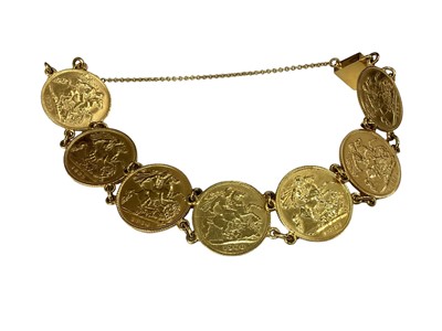 Lot 542 - G.B. - A gold bracelet containing seven Half Sovereigns (N.B. Total Wt. 33.5gms) (1 coin bracelet)