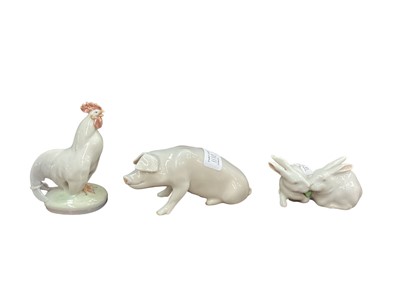 Lot 1110 - Three Royal Copenhagen models - Cockerel 1126, Pig 1400 and Rabbits 518